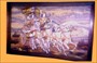  WOODEN FRAME WITH A PAINTING OF GEETA UPADESHAM